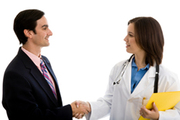 Salesman and doctor shaking hands