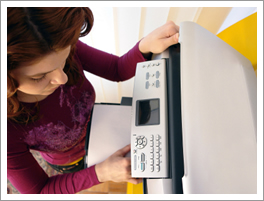 Commercial copiers Commercial copier being used in an office