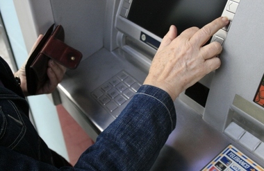 ATM in Use