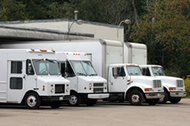 Row of trucks at a loading dock Row of trucks at a loading dock